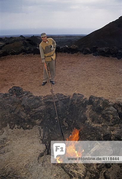 Volcanic fire in Timanfaya National Park  Lanzarote Island  Canary Islands  Spain  Europe