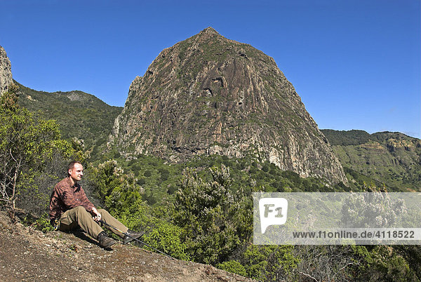 Hiker in front of Ojila mountain  La Gomera Island  Canary Islands  Spain  Europe