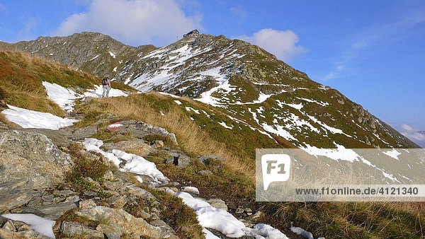 Hiker climbing mountain up to Kellerjoch Cabin  Schwaz  Tirol  Austria