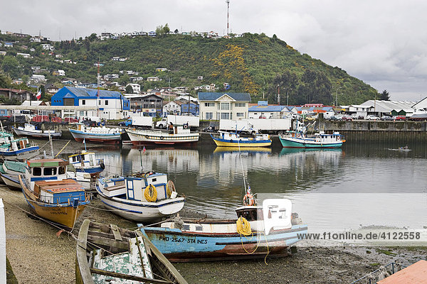 Small fishing boats in the harbour at Puerto Mont  Region de los Lagos  Chile  South America