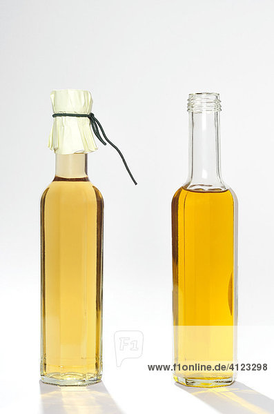Two bottles  balsamic vinegar and olive oil