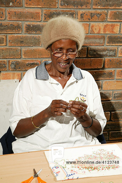 Bead embroiderer producing Christmas decorations  Cape Town  South Africa