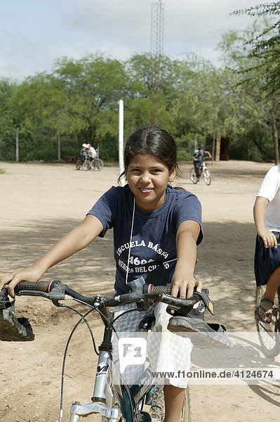 Cycling girl  Loma Plata  Chaco  Paraguay