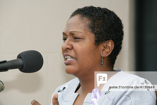 Minister of Social Affairs Priya Manickchand speaking at a protest against violence against women  Georgetown  Guyana  South America