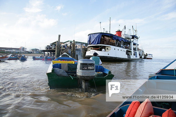 Passenger traffic dock along the Demerara River in Georgetown  Guyana  South America