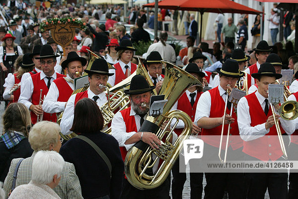 Brass band performing at an international festival for traditional costume in Muehldorf am Inn  Upper Bavaria  Bavaria  Germany  Europe
