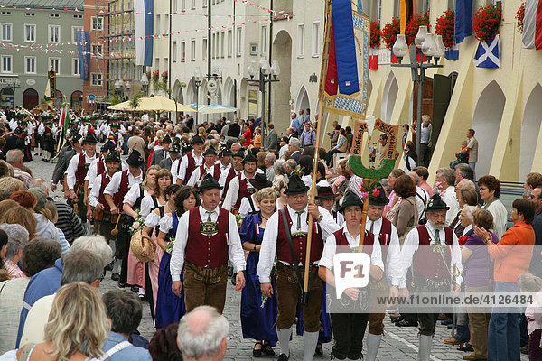 Group of people dressed in traditional garb at an international festival for traditional costume in Muehldorf am Inn  Upper Bavaria  Bavaria  Germany  Europe
