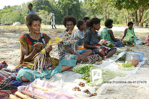Women selling vegetables at a market  Heldsbach  Papua New Guinea  Melanesia