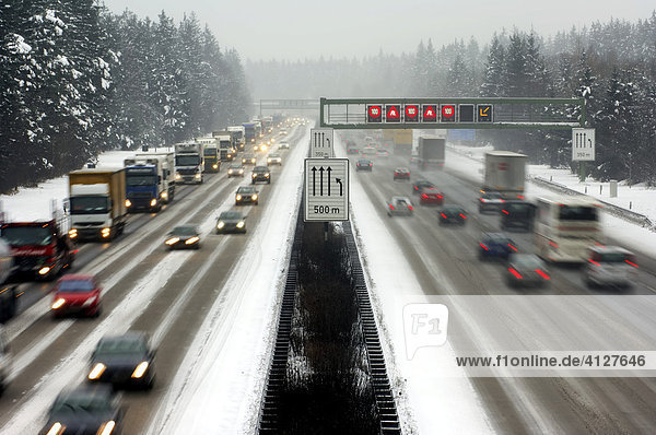 Highway at wintry road conditions traffic jam on the higway