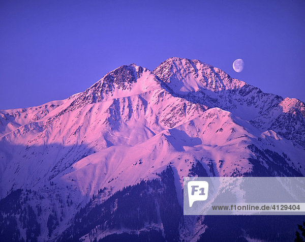Hocheder in the Stubai Alps  winter  moon in the morning  Tyrol  Austria