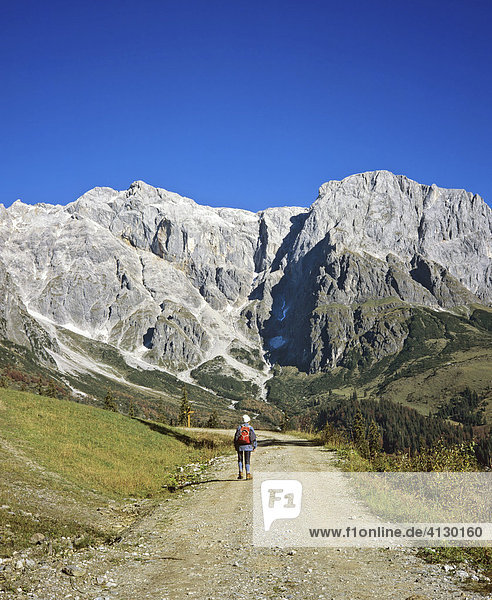 Hiker on a path through the Berchtesgadener Alps  Salzburger Land  Austria  Europe