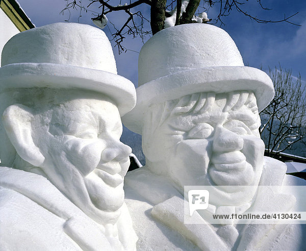 Snow sculptures of Laurel and Hardy  snow festival in Seefeld  Tyrol  Austria