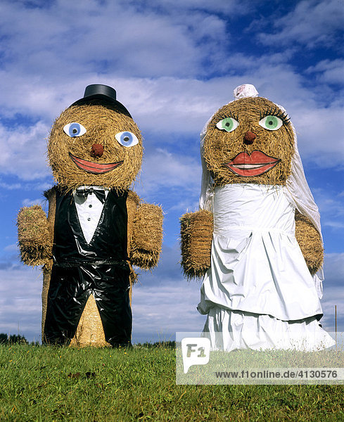 Bridal couple made out of bales of straw  wedding  Upper Bavaria  Bavaria  Germany
