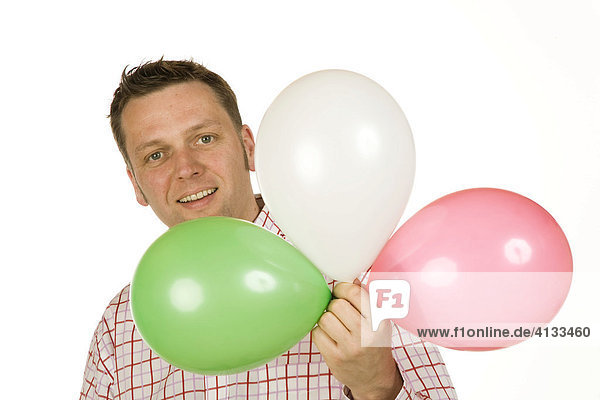 Mann  40-jährig  mit Luftballons