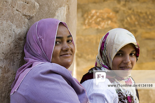 Two Muslim women in the Luxor Temple  Luxor  Nile Valley  Egypt  Africa