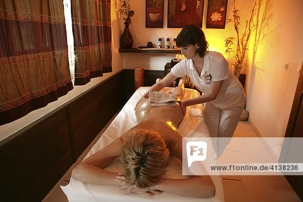 AUT  Austria  Neustift-Milders  Stubai Valley: Wellness. young woman in a spa. Ayurvedic massage. Wellness-Spa Hotel Milderer Hof. |