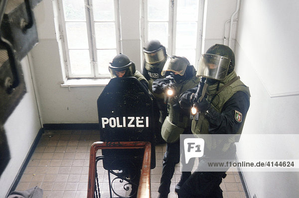 DEU  Germany: Police SWAT Team  for arresting armed and dangerous criminals. They are specialists for rescuing hostages. They have special weapons and equipment.