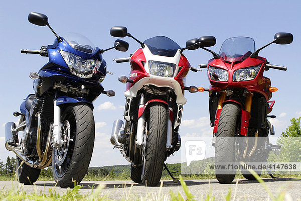Three motorbikes