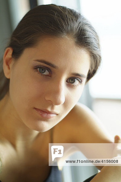 Portrait of a young woman in sports clothes