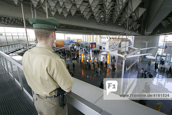 German police officer in the departure terminal of the Airport  Frankfurt  Hesse  Germany