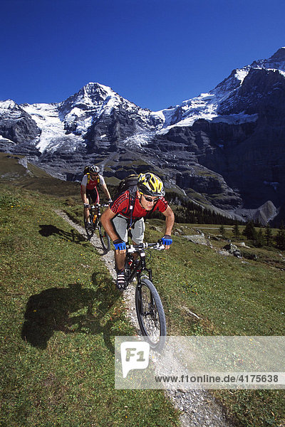 Mountain bikers  Jungfrau  Little Scheidegg  Grindelwald  Bernese Oberland  Switzerland
