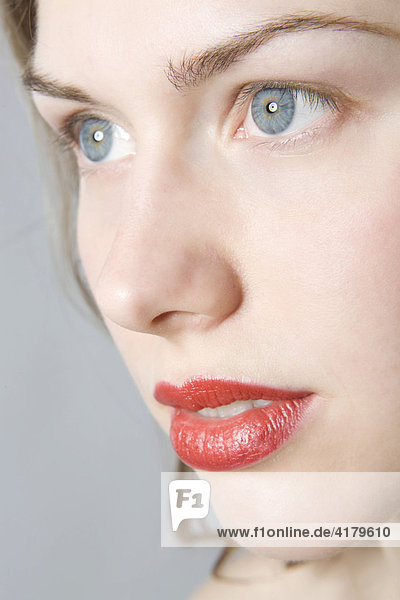 Portrait of woman wearing red lipstick