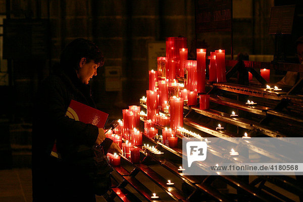 Candles inside the cathedral in Barcelona  Catalonia  Spain