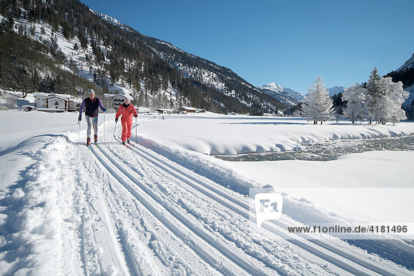 Cross-country skiers in Hinterriss  Tyrol  Austria  Europe