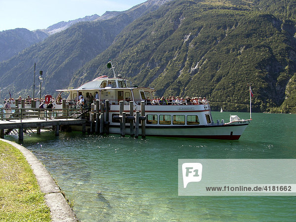 Excursion boat at the pier on the Achen lake  Tyrol  Austria