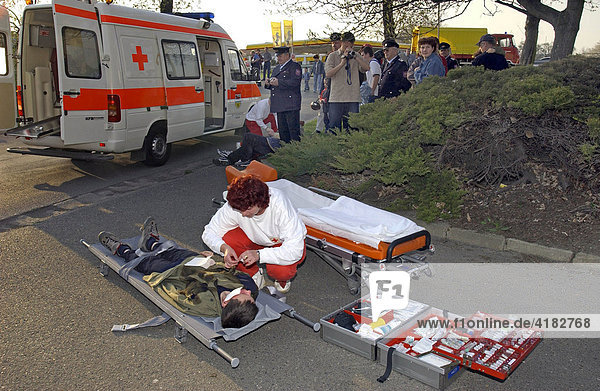 Emergency drill  burn victim is being cared for on a stretcher