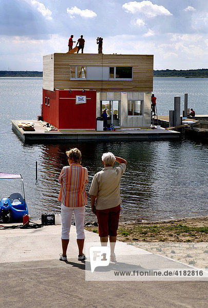 Swimming houses at the Graebendorfer Lake  Brandenburg  Germany