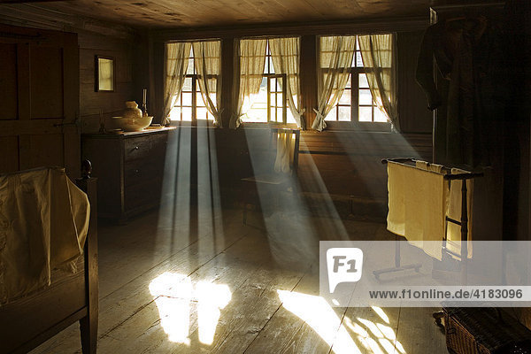 Bedroom of an old farm-house  light beams  Open-air museum Ballenberg  Brienz  Switzerland  Europe
