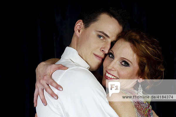 Couple dressed in evening wear  hugging