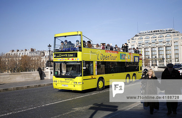 Sightseeing bus on the Pont Neuf bridge in Paris  France  Europe