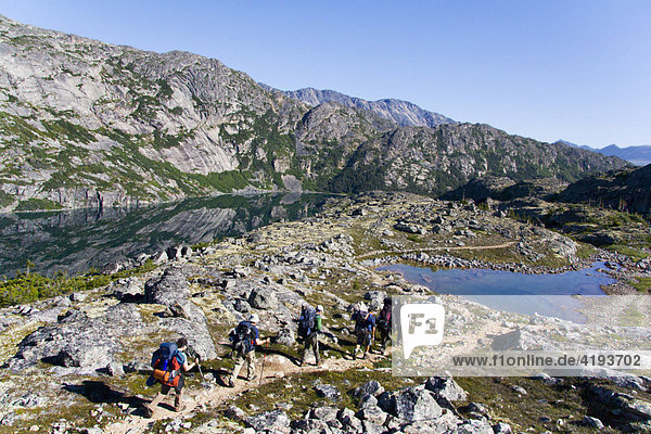 Group of hikers  mountain landscape  Chilkoot Trail  British Columbia  Canada