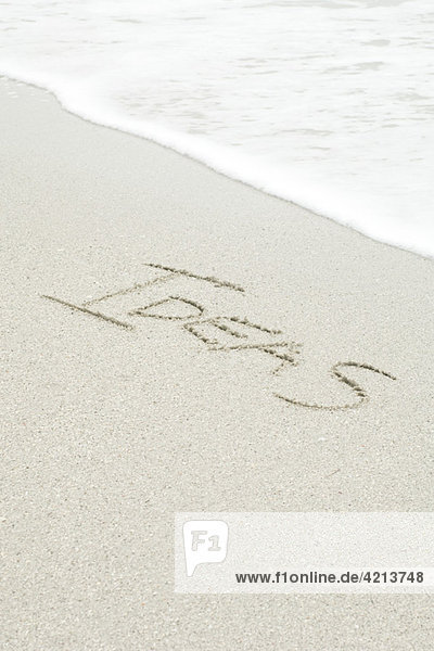 'The word ''ideas'' written in the sand at the beach'