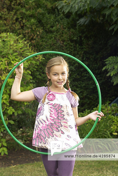 Young girl portrait in a hoop