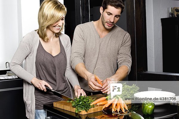 Young couple in kitchen
