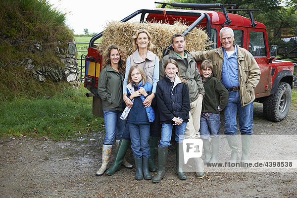 Family with 4x4 Landrover