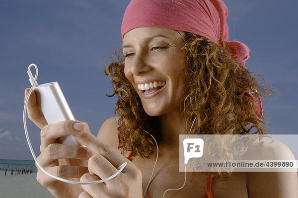 Woman hearing music