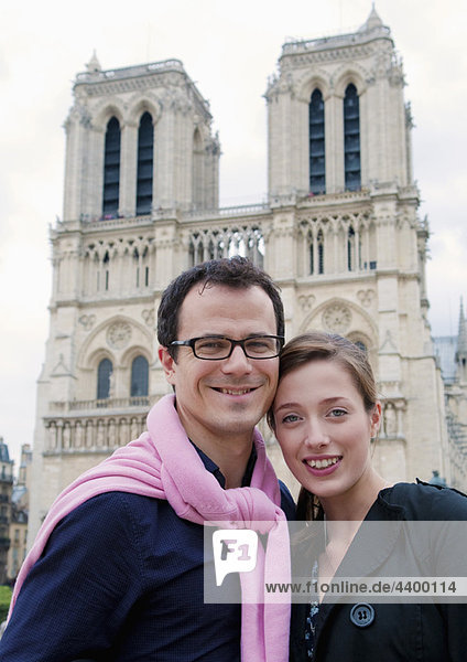 Couple in front of Notre Dame Paris