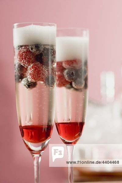 Sparkling Wine Cocktails With Liqueur And Berries