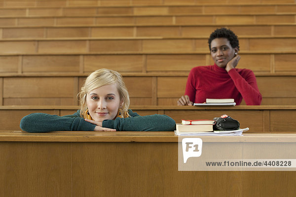 Germany  Leipzig  Students sitting in auditorium  smiling  portrait