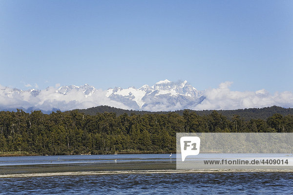 New Zealand  South Island  West Coast  View of Okarito Lagoon with mountains in background