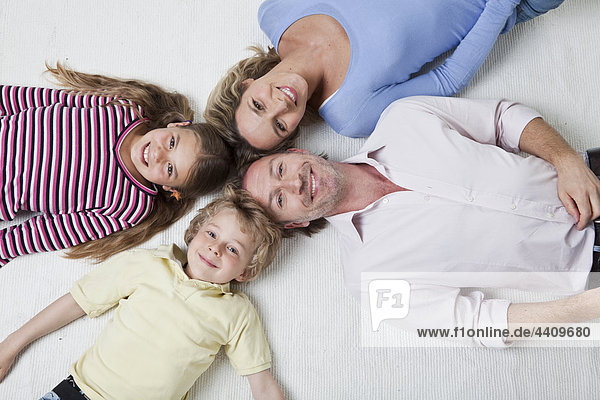 Overhead view of family smiling  portrait