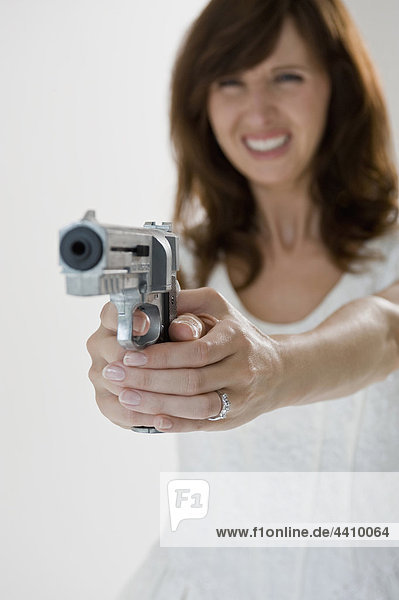Bride holding pistol