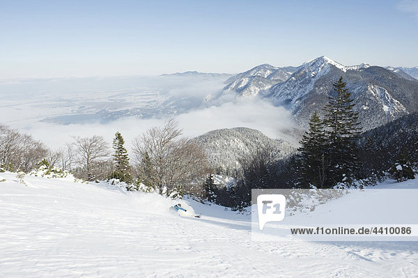 Germany Man skiing on herzogstand mountain
