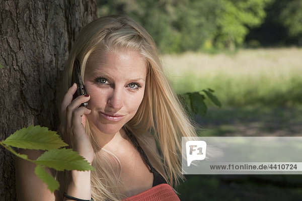 Young woman on the phone  portrait