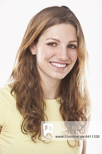 Young woman smiling  close-up  portrait