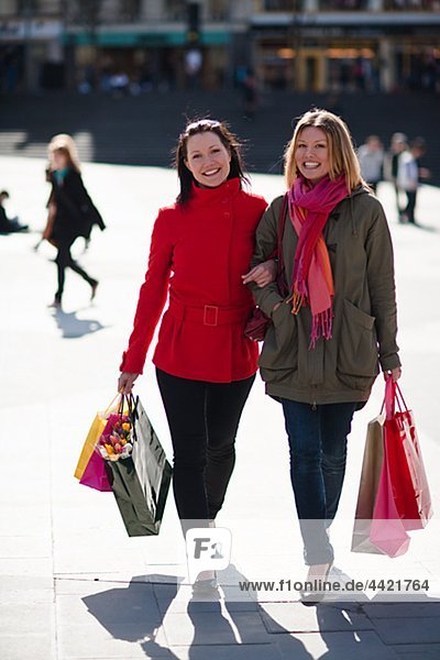 Pair of young women shopping